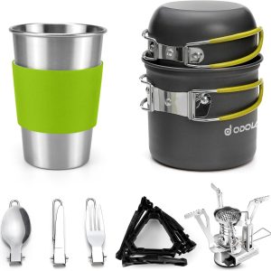 Odoland camping cookware set with stove, pot, cup, and utensils on a picnic table